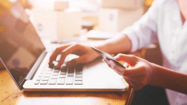 women hands holding credit card for online payment