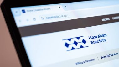 Hawaiian Electric website displayed on laptop screen showcasing energy services and utility solutions