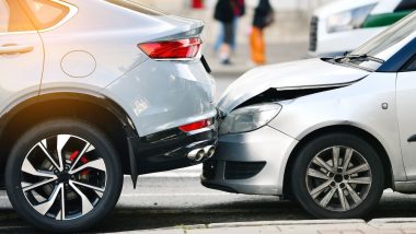 Rear end collision between two cars on urban street